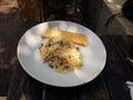 Creamy Mushroom Spagetti Pasta with Garlic Bread Royalty Free Stock Photo