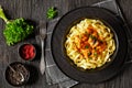 Creamy Paprika Pork Chunks over tagliatelle noodle Royalty Free Stock Photo