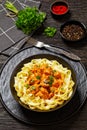 Creamy Paprika Pork Chunks over tagliatelle noodle Royalty Free Stock Photo