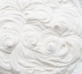 Creamy pics in yoghurt or cream surface. Top view Royalty Free Stock Photo