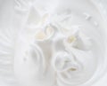 Creamy pics in yoghurt or cream surface. Top view Royalty Free Stock Photo