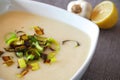 Creamy potato soup with fried leek detail Royalty Free Stock Photo