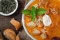 Creamy pumpkin soup garnished with croutons