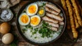 Creamy Rice Porridge with Eggs & Pork Royalty Free Stock Photo