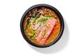 Creamy salmon miso soup with white miso paste, dried alaria, shiitake, rice noodles, chopped scallions and sesame Royalty Free Stock Photo