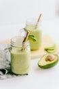 creamy smoothie from avocado and banana in glass cups Royalty Free Stock Photo