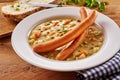 Creamy Soup with Wiener Sausage Served with Bread Royalty Free Stock Photo
