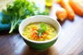 creamy split pea soup with diced carrots for color contrast