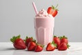 Creamy strawberry milkshake isolated on white background