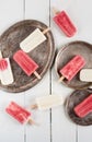 Creamy and strawberry popsicles