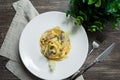 Creamy tagliatelle pasta fettuccini with mushrooms and parmesan cheese Royalty Free Stock Photo