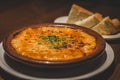 Creamy Tokyo Style Lasagna served in a brown china bowl with bread