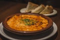 Creamy Tokyo Style Lasagna served in a brown china bowl with bread