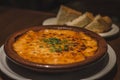 Creamy Tokyo Style Lasagna served in a brown china bowl with bread
