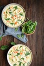 Creamy Tortellini pasta soup with spinach, celery, carrot and chicken broth Royalty Free Stock Photo