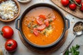 Creamy vegetable soup preparation with fresh ingredients in a cozy kitchen setting Royalty Free Stock Photo