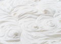 Creamy waves and swirls in yoghurt or cream surface. Top view Royalty Free Stock Photo