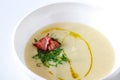 Creamy white asparagus and potato soup with bacon