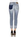 Crease & Clips Slim Women`s Light Blue Jeans, Woman in Blue tight jeans with white heels, white background