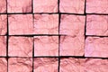 Creased Pink Aluminum foil Squares on black Background