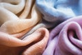 Creased thin wool fabrics heap at bright light closeup