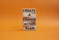 Create a change action plan symbol. Business Concept words Create a change action plan on wooden blocks. Beautiful orange Royalty Free Stock Photo