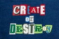 CREATE OR DESTROY text word collage colorful fabric on denim, encourage or discourage Royalty Free Stock Photo