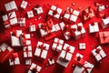 Create a dynamic and festive image with Christmas gift boxes falling or flying in motion against a vibrant red background. Convey