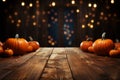 Create eerie presentations on a wooden table with a Halloween pumpkin