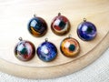 Create galaxy drink coasters using resin, glitter and pigment powders, handmade items. Suitable for keychains, necklace and