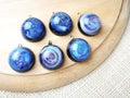 Create galaxy drink coasters using resin, glitter and pigment powders, handmade items. Suitable for keychains, necklace and