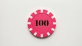 create an image of a single pink 100dollar poker chip ai generated Royalty Free Stock Photo