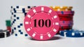 create an image of a single pink 100dollar poker chip ai generated Royalty Free Stock Photo