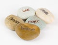 Create, magic, believe, dream, and love stones Royalty Free Stock Photo