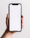 Mockup of a cellphone holding hand Royalty Free Stock Photo