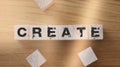Create word on wooden cubes. Creativity development education concept Royalty Free Stock Photo