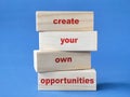 create your own opportunities, text words typography written on wooden blocks, life business and self development Royalty Free Stock Photo