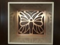 Created in the carvings of a nice wood butterfly Royalty Free Stock Photo