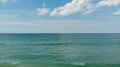 Above view gulf of Mexico. Tropical blue sea and blue sky with sun, clouds. clear water in the ocean. A blue, green, sea surface f