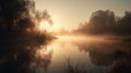 misty sunrise over lake, with reflections of trees and water Royalty Free Stock Photo