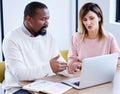 Creating a campaign that lasts in the longterm. two mature businesspeople working together on a laptop in an office. Royalty Free Stock Photo