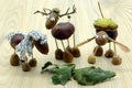 Creating acorn chestnut figures like horse and deer in autumn time. childhood tinker