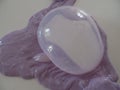 Creating a giant bubble from stretchy lilac coloured slime