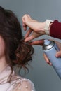 Hairdresser making hairstyle to girl in beauty salon Royalty Free Stock Photo