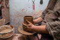 Creating a pot of clay close-up. Hands making products from clay. Potter at work Royalty Free Stock Photo