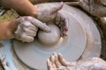 Creating a sculpture of clay close-up. Hands making products from clay. The sculptor at work