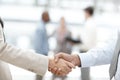 Creating solid corporate partnerships. Cropped view of two businesspeople shaking hands. Royalty Free Stock Photo