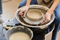 Creating unique pottery pieces in a Royalty Free Stock Photo