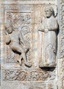 Creation of Adam, medieval relief on the facade of Basilica of San Zeno in Verona