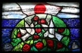 Creation and birth, detail of stained glass window in St. James church in Hohenberg, Germany
